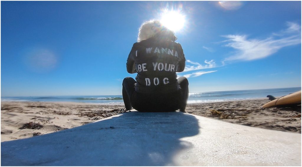 Surfer girl in Los Angeles and County Line in O'Neil and Billabong west suit. Shot on a GoPro.