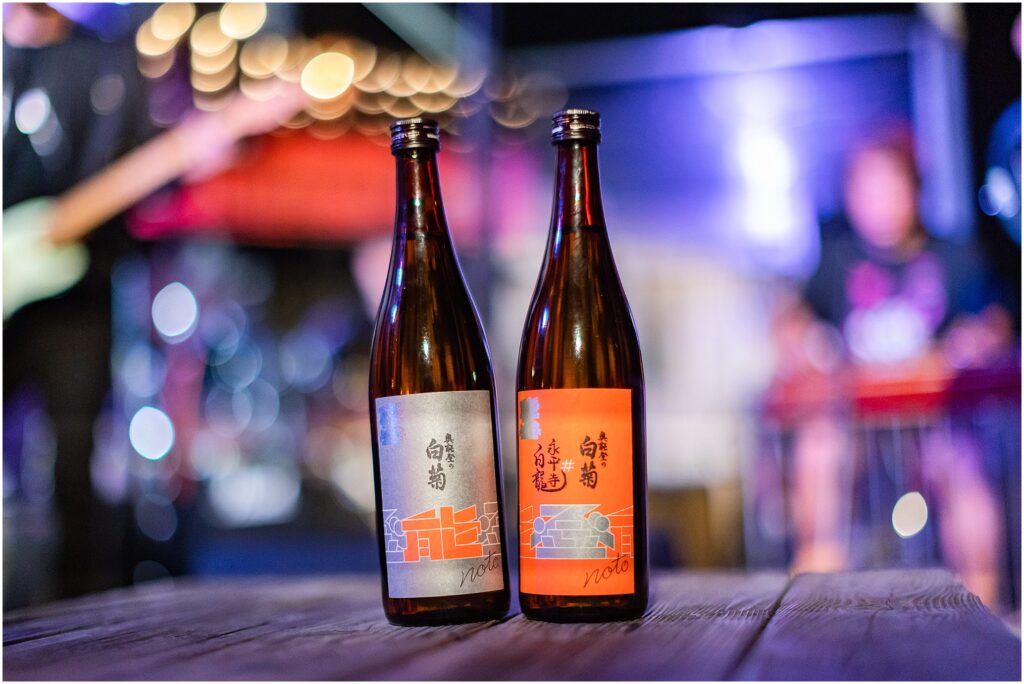 The Support Sake Tour! American rock band, The Falling Doves, traveled around Japan to perform their music and help bring some awareness to the diminishing Japanese sake industry by bridging music and culture. - SURFERS, Zushi Beach
